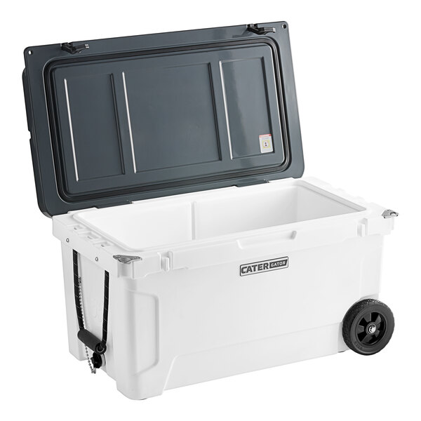 A white CaterGator outdoor cooler with black wheels.