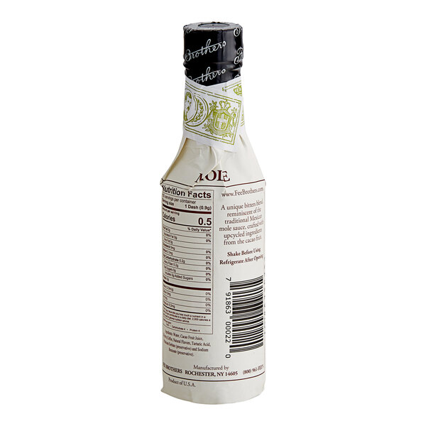 A bottle of Fee Brothers Mole Bitters with a label on it.
