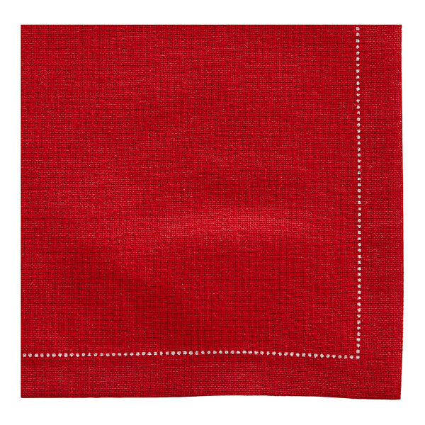 A red cloth napkin with a white stitch.