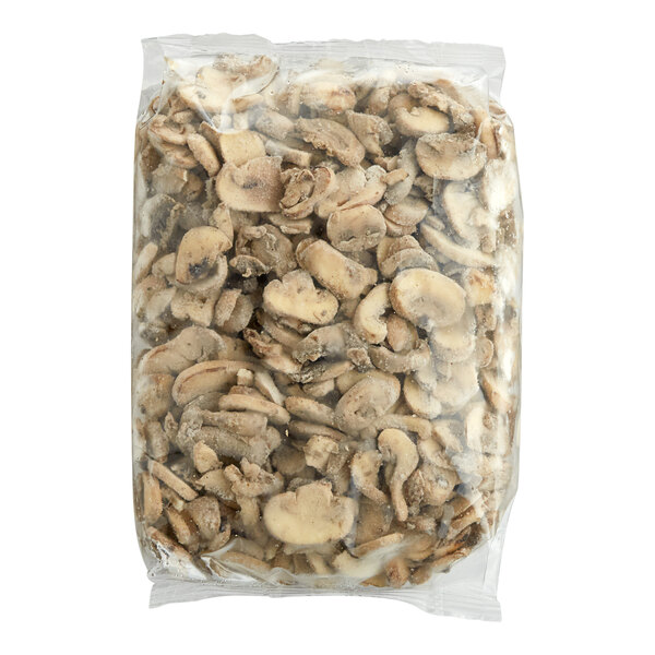 A plastic bag of Phillips Gourmet Mushrooms IQF Seasoned Sautéed Roasted Sliced White Mushrooms.