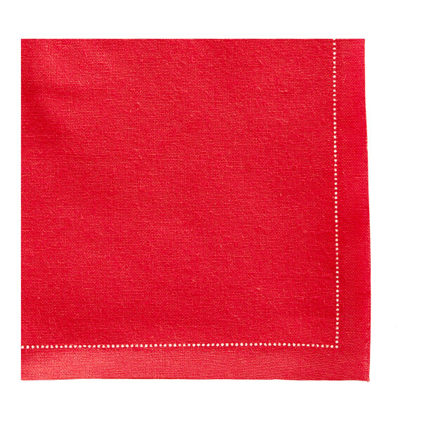 A red cloth napkin with white stitching.
