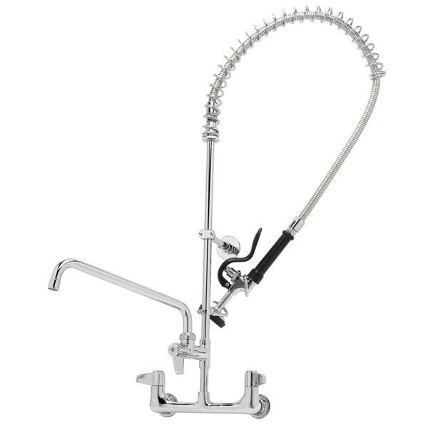 A chrome Equip by T&S wall mounted pre-rinse faucet with a hose and add-on faucet.
