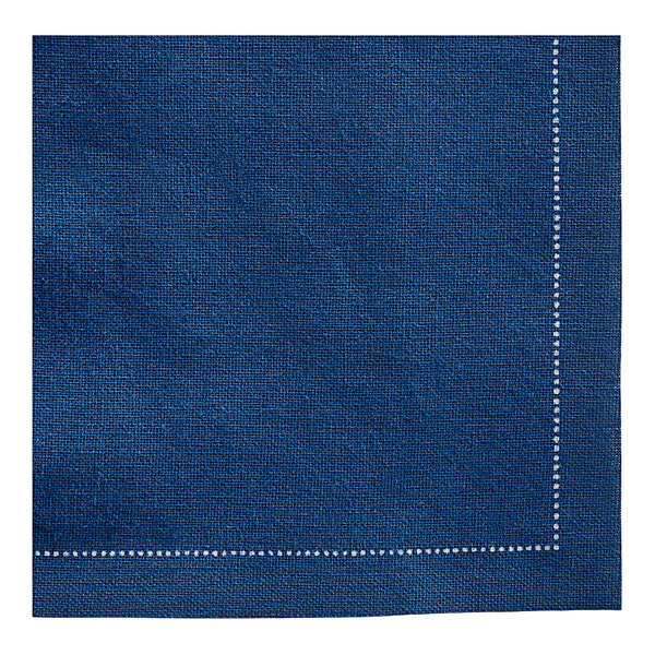 A navy blue cloth napkin with white stitching.