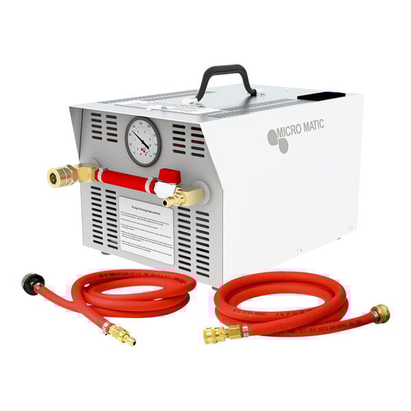 A Micro Matic electric recirculating draft beer line cleaning pump with hoses and a gauge.