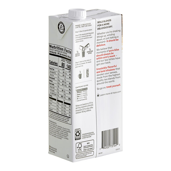 A white carton of Tazo Espresso Chai Latte concentrate with black and red text.