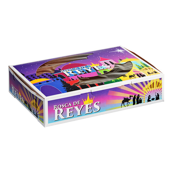 A white Southern Champion cake box with a window and a picture of a castle on it.