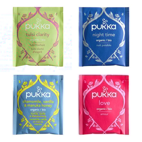A group of Pukka Organic Relax Tea bags in various colored packages. The packages are pink, blue, and green with white and yellow text.