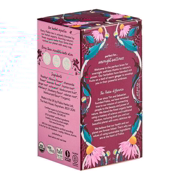A white box of Pukka Organic Night Time Berry Herbal Tea Bags with pink flowers and leaves.