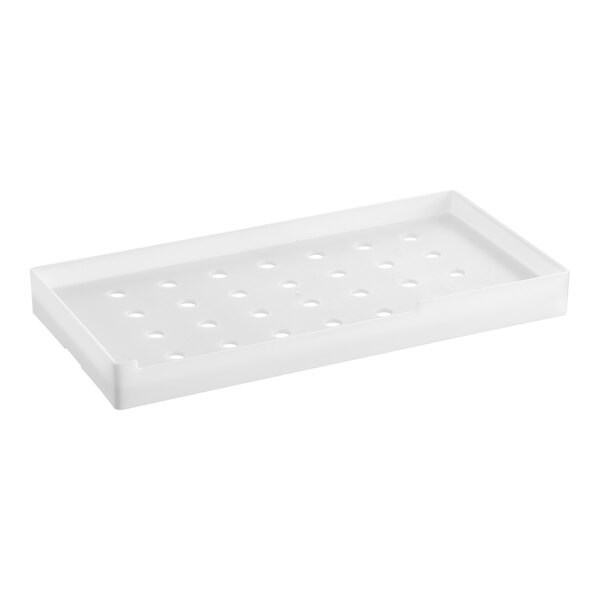A white plastic Avantco Ice evaporator tray with holes.