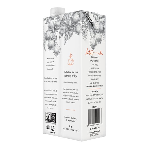 A white carton of Milkadamia Barista Unsweetened Macadamia Milk with text and pictures on the box.