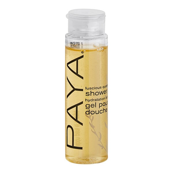 A PAYA Papaya shower gel bottle with yellow liquid and a pump.