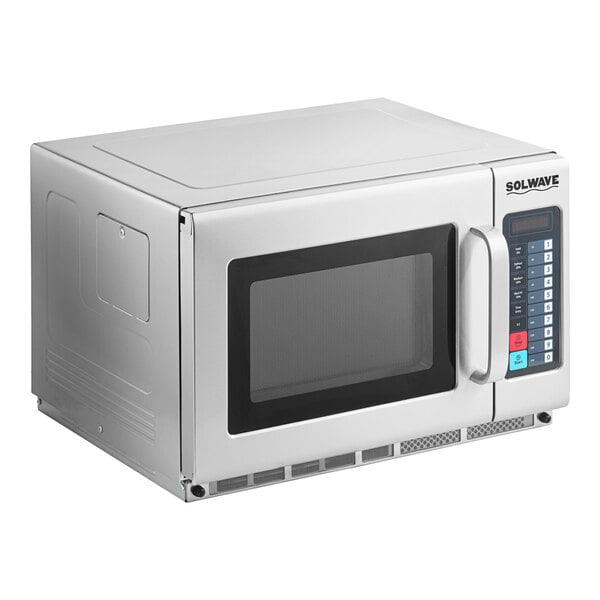 A Solwave white commercial microwave oven with a black door.