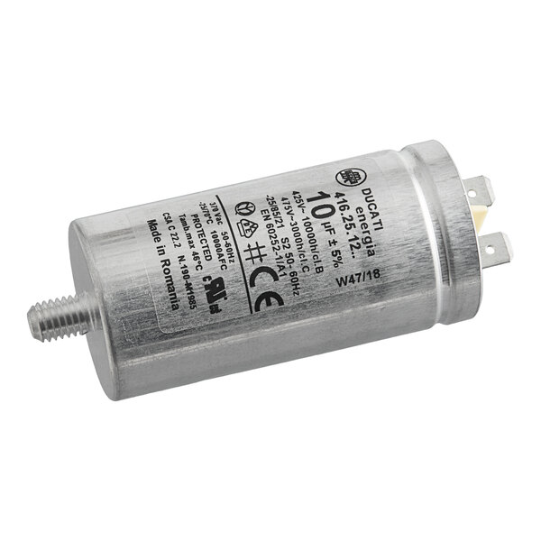 A silver metal Noble Warewashing capacitor with a white label.
