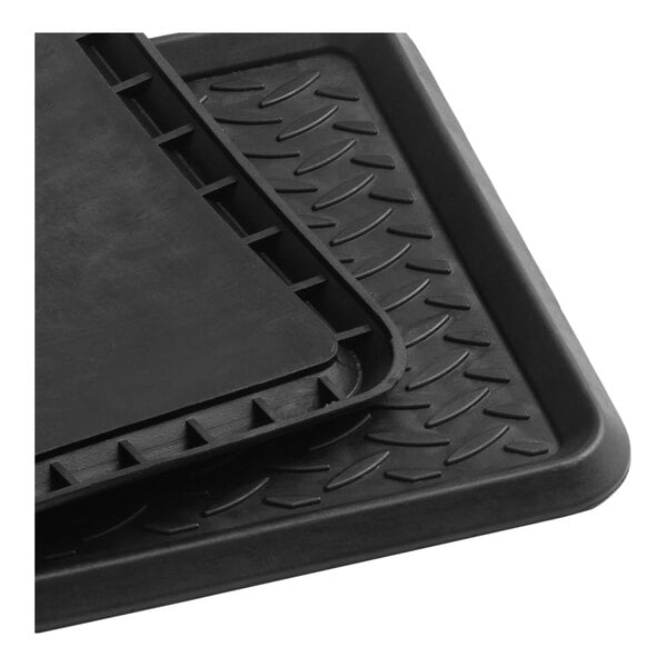 A black rubber boot tray and scraper mat with a diamond pattern and raised edges.