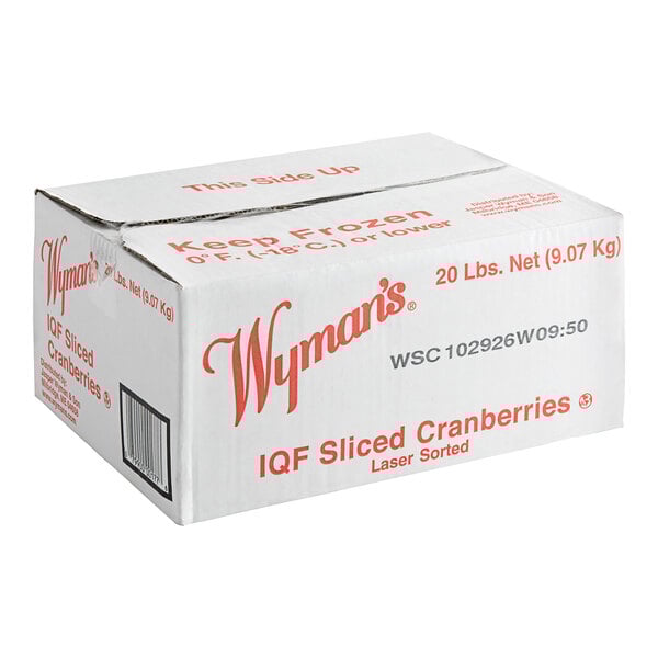 A white box of Wyman's sliced cranberries with red text on a counter.