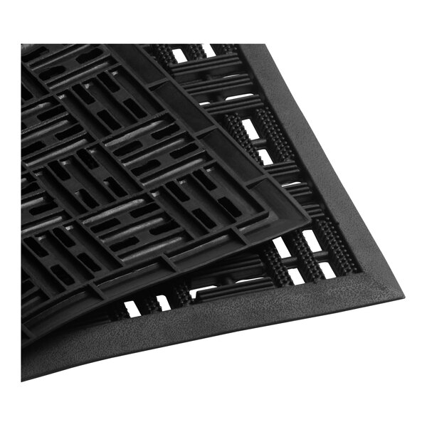 A black rubber scraper entrance mat with a parquet pattern and raised edges.