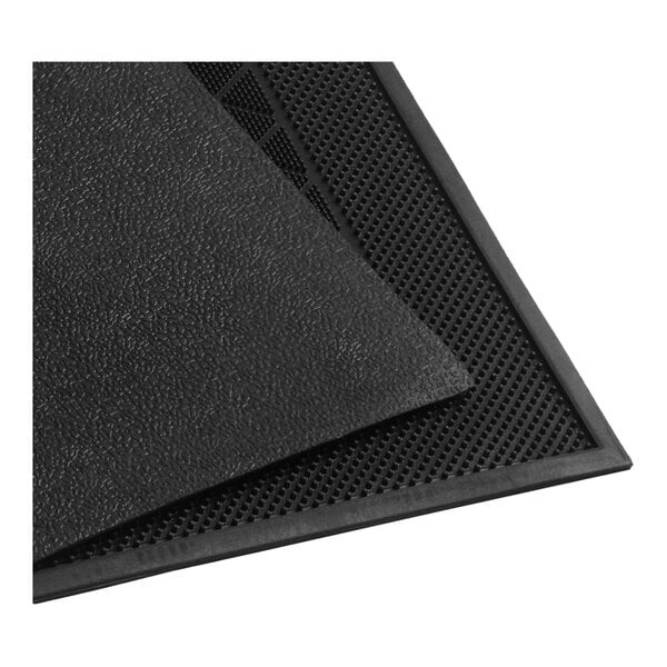 A black rubber entrance mat with a textured surface and diamond pattern, measuring 1 1/2' x 2 1/2' and 3/8" thick.