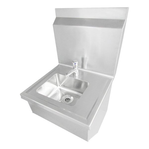 A stainless steel wall-mounted hand sink with a self-closing deck-mount faucet and a backsplash.