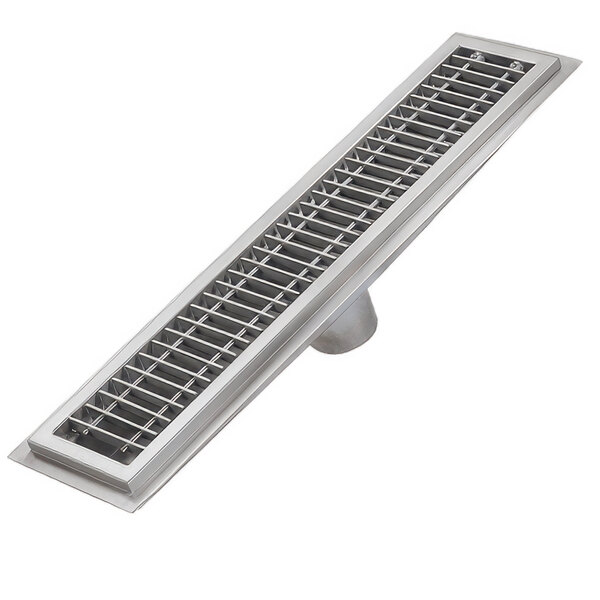 An IMC/Teddy stainless steel floor trough drain with subway grating.