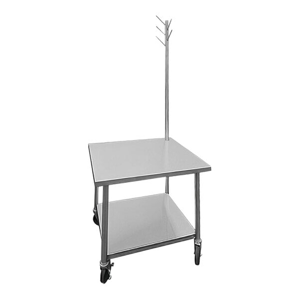 A stainless steel mixer or equipment table with an undershelf, tool tree, and heavy-duty casters.