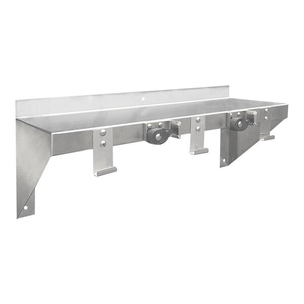 A stainless steel wall-mounted utility shelf with two mop holders and three rag hooks.