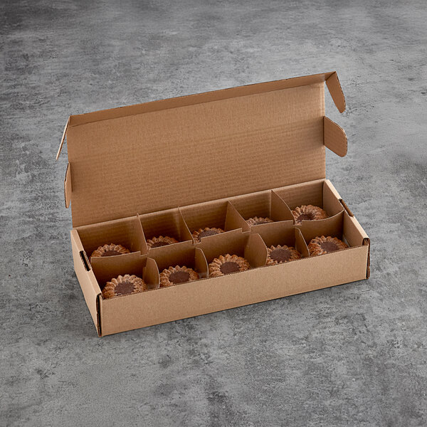 A white box of 20 White Toque gluten-free vegan molten banana personal cakes.