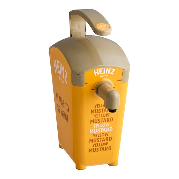 A yellow Heinz mustard pump dispenser on a countertop.