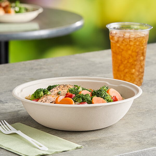 A close-up of a World Centric Compostable take-out bowl filled with food.