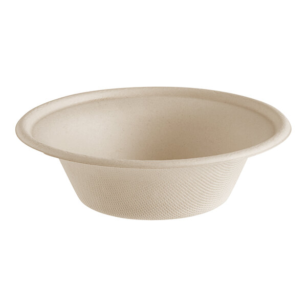 A World Centric compostable fiber bowl with a white surface.