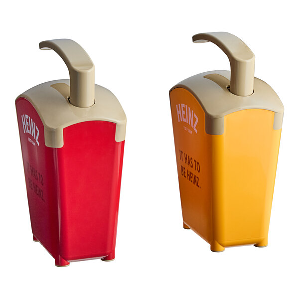 A set of red and yellow plastic countertop pump dispensers with handles.