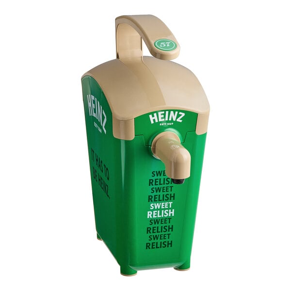 A green and tan Heinz plastic countertop sweet relish pump dispenser.