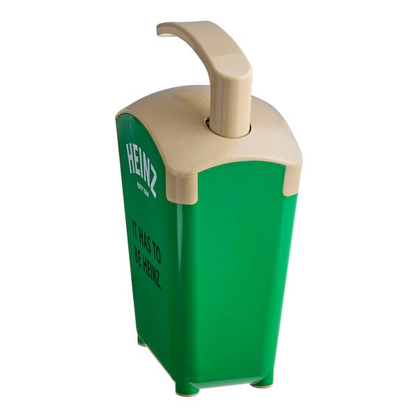 A green and tan Heinz plastic countertop sweet relish pump dispenser with white text.