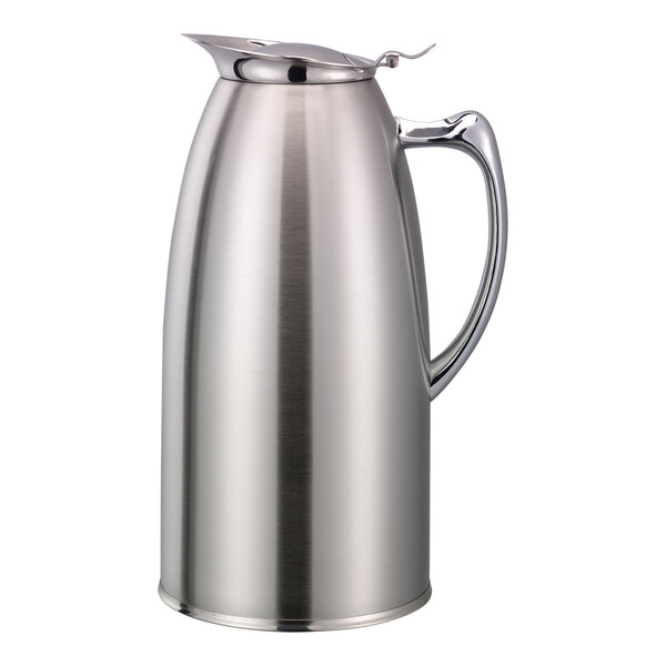 A stainless steel Service Ideas foam insulated coffee pitcher with a handle and lid.