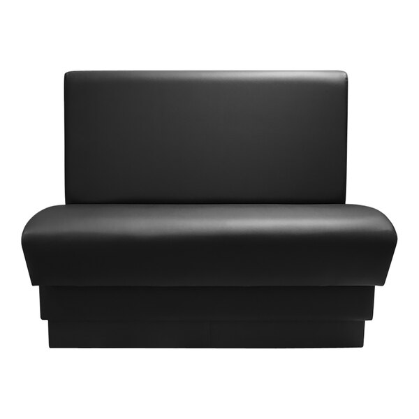 A black rectangular booth with a black seat.