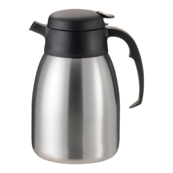 A silver stainless steel Service Ideas SteelVac coffee carafe with a black push button lid.