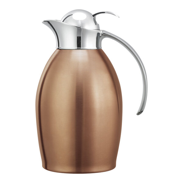 A rose gold stainless steel Service Ideas Nicollet coffee carafe with push button lid.