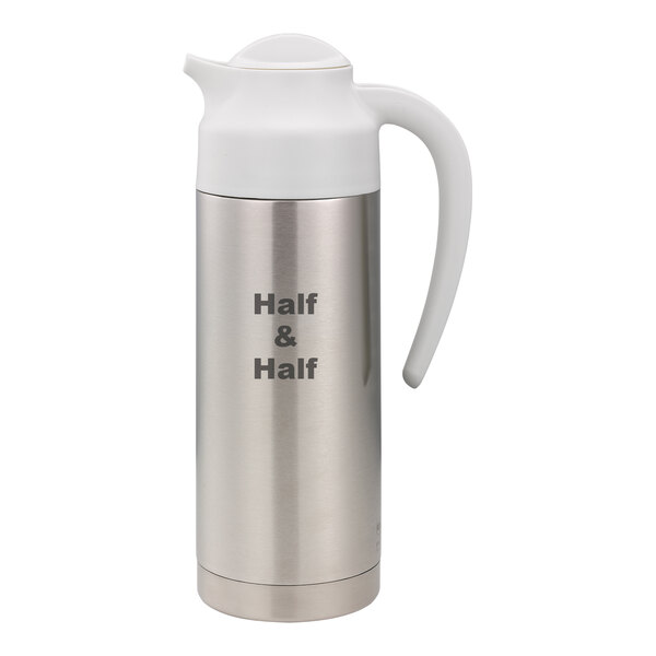 A stainless steel Service Ideas SteelVac™ creamer with white "Half & Half" lid.