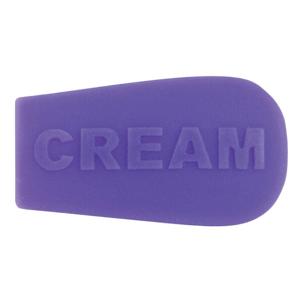 A purple silicone creamer indicator with white text reading "Cream"