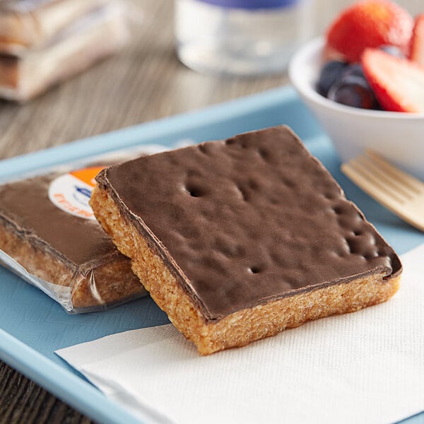 A Best Maid Crispy Peanut Butter Bar on a blue and white wrapper.