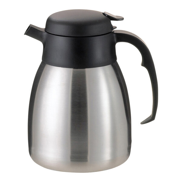A silver stainless steel Service Ideas SteelVac carafe with a black lid and handle.