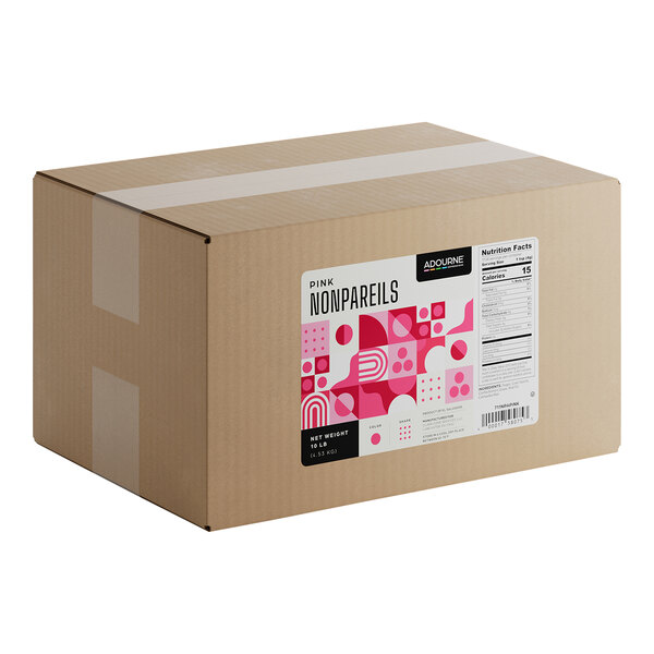 A large cardboard box labeled as containing 10 pounds of Adourne Pink Nonpareils.