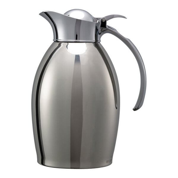 A stainless steel Service Ideas Nicollet coffee carafe with a handle and flip top lid.