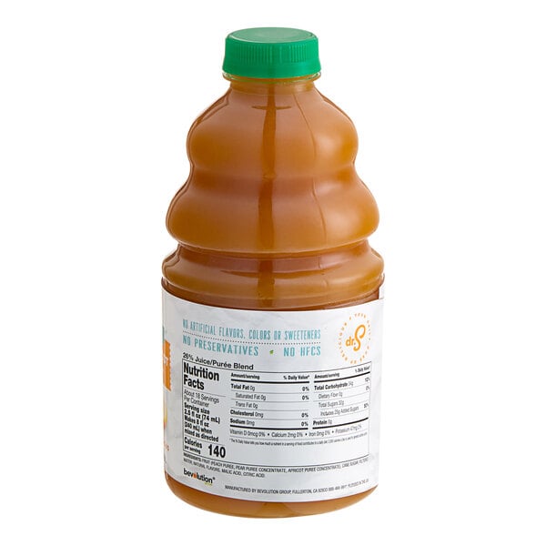A bottle of Dr. Smoothie Classic Peach Pear Apricot fruit smoothie mix with a label.