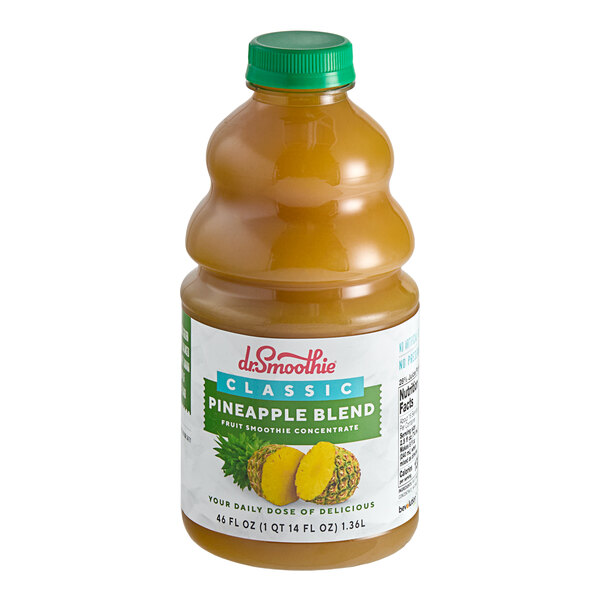 A bottle of Dr. Smoothie Classic Pineapple Blend fruit smoothie mix with a green cap.