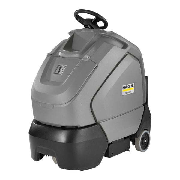 A Karcher stand-on vacuum cleaner with wheels on a white background.