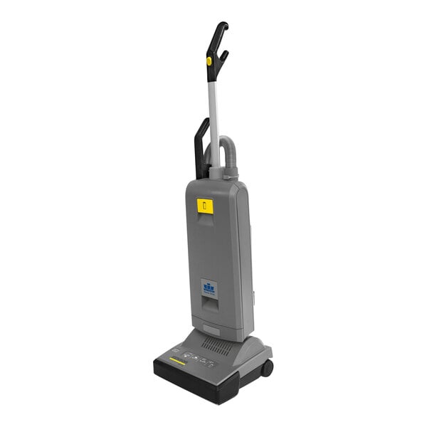 A grey Karcher Sensor XP upright vacuum cleaner with a yellow handle and black wheels.