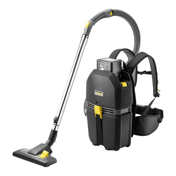 A black and yellow Karcher BVL 5/1 BP cordless backpack vacuum with a tube and white text on the front strap.