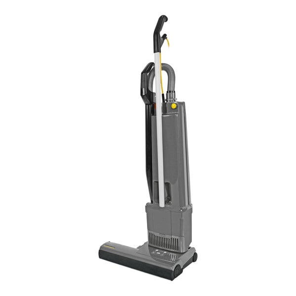 A Karcher Versamatic HEPA 18 vacuum cleaner with a black and yellow handle.