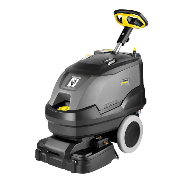 A Karcher self-propelled walk behind carpet extractor with wheels.