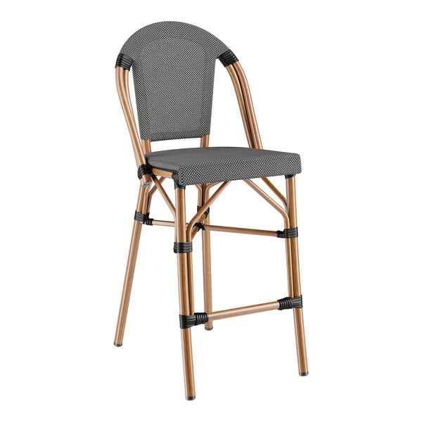 A Lancaster Table & Seating black and white outdoor restaurant barstool with a black seat.